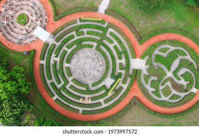 Aerial View Above An Interesting Bush Maze Of Three Connecting Circular Labyrinths On The Green Grassy Lawn Of A Park In Ji'an Township, Hualien County, Taiwan