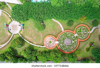 Aerial View Above An Interesting Bush Maze Of Three Connecting Circular Labyrinths On The Grassy Lawn In Cikasoan Forest Park, Ji'an Township, Hualien, Taiwan