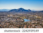 Aerial view from above Scottsdale looking SW towards Camelback Mountain and downtown Phoenix, Arizona