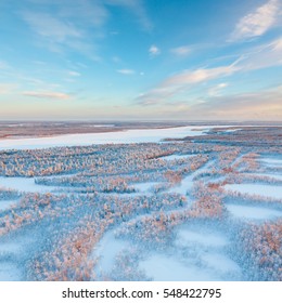 Aerial View Above The Snow Covered Tundra In Time Of Short Winter Day.