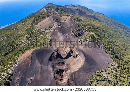 Aerial view above the volcanic craters of Cumbre Vieja in La Palma - Lavas la Malforada