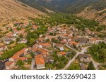 Aerial view of Agios Germanos is a village in the Prespes in West Macedonia, Greece. It is 7 kilometers from the Prespes lakes, which can be seen from a panorama location of the village.