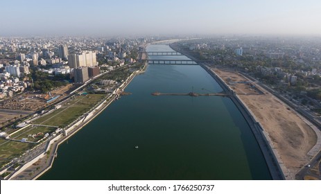 Aerial View Of Ahmedabad,Gujarat/India. Riverfront And Garden With Skyline Buildings Drone View Landscape. Post Coronavirus Covid-19 City Reopens. Social Distancing Rules After City Restrictions Ease.