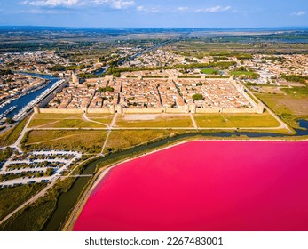 The aerial view of Aigues-Mortes, a medieval city surronded by walls in the Occitanie region of southern France