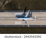 Aerial view of an airport. aerial view of airport terminal with parked airplanes