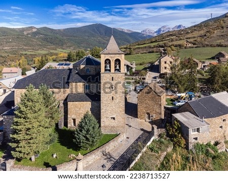 aerial view of Aisa town with the mountains in the background, Aisa, Huesca, Pyrenean mountain range, Spain