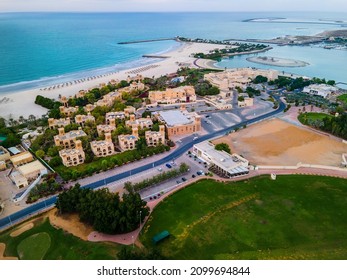 Aerial view of Al Hamra golf course and famous residential area Al Hamra village in Ras al Khaimah, United Arab Emirates - Shutterstock ID 2099694844