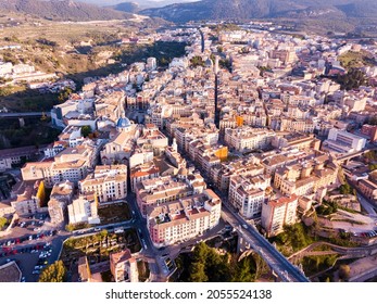 Aerial view of Alcoi cityscape with blue dome of Archpriest church of Santa Maria, Spain