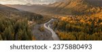 Aerial view along the Mt. Baker Highway of the Nooksack River during the fall season. Towering evergreens and leaf maples line the route of SR542 from Bellingham to Artisst Point and Heather Meadows.