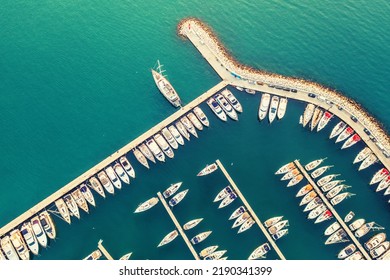 Aerial view of amazing boats in Croatia. Minimalistic landscape background with boats and sea in marina bay. Top view from drone of harbor with yacht, motorboat and sailboat. Beautiful port - Shutterstock ID 2190341399