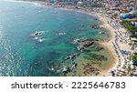 Aerial view of an amazing sand beach with turquoise warm waters packed with locals and tourists in the heart of Salvador, Bahia, Brazil