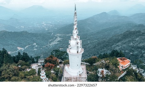 Aerial view of Ambuluwawa tower is a temple of four religions central Sri Lanka. Tower rises above the jungle on a high mountain.