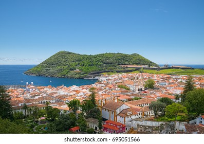 Aerial View Of Angra Do Heroismo City And Monte Brasil Mountain, Located On Azorean Island Of Terceira, Portugal.