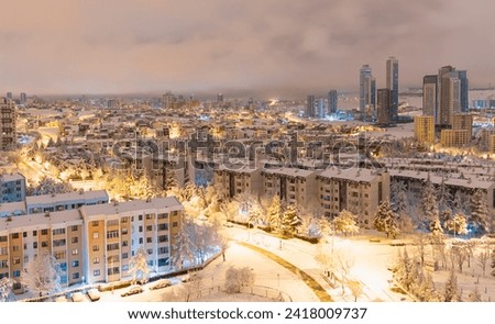 Aerial view of Ankara the capital city of Turkey covered with snow in winter - Konutkent, Ankara