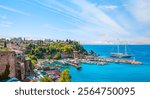 Aerial view of Antalya old town or harbour (Kaleici), Bay with ships and boats in summer - Antalya, Turkey 