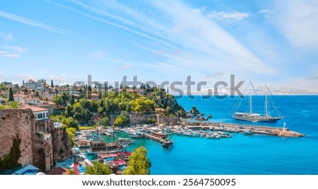 Aerial view of Antalya old town or harbour (Kaleici), Bay with ships and boats in summer - Antalya, Turkey 