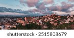 Aerial view of Antananarivo at sunset highlighting the cityscape and vibrant colors of the sky