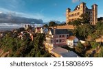 Aerial view of Antananarivo at sunset showcasing its vibrant architecture and hilly landscape