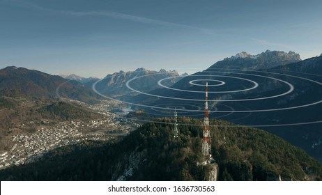 Aerial view of antennas transmitting radio signals in rural mountainous area