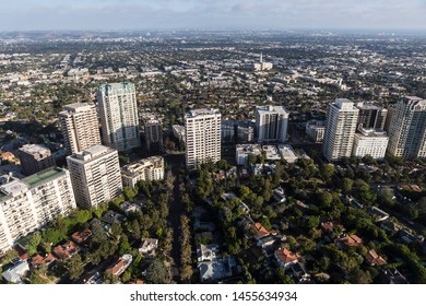 Aerial view of apartments, condos and houses along Wilshire Blvd near Century City in Los Angeles, California.