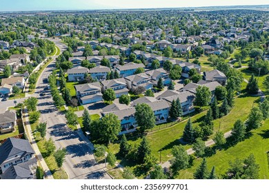 Aerial view of Arbor Creek which is a primarily residential neighbourhood located in northeast Saskatoon, Saskatchewan, Canada. It is mostly made up of low-density single detached dwellings.  - Shutterstock ID 2356997701