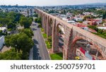 Aerial view of the arches of the center of the city of Querétaro in a sunset.