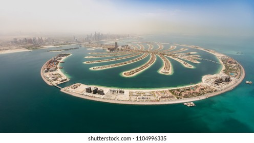 Aerial view of artificial palm island in Dubai. Panoramic view.