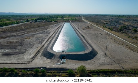 Aerial View Of Artificial Water Reservoir For Agricultural Irrigation.