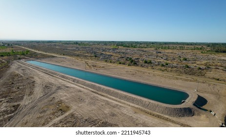 Aerial View Of Artificial Water Reservoir For Agricultural Irrigation.