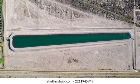 Aerial View Of Artificial Water Reservoir For Agricultural Irrigation.