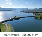 aerial view of the ashokan reservoir in upstate new york (near woodstock olivebridge) nyc drinking water and catskill mountains (catskills hills background) park road walkway bridge crossing lake pond