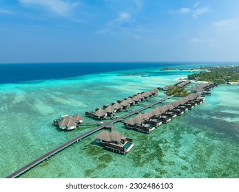 aerial view, Asia, Maldives, North Male Atoll, Kuda Huraa,  Four Season Maldives, , with beaches and water bungalows
