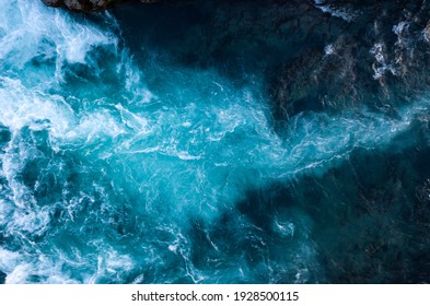 Aerial view of Atlantic ocean waves washing black basaltic sand beach, Iceland