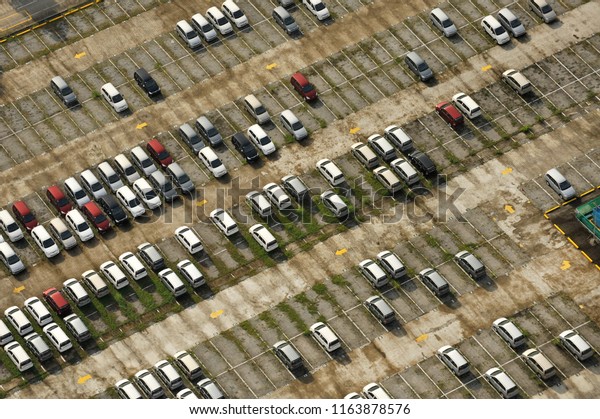 Aerial view of automotive\
plant yard.