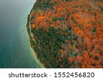 Aerial view of autumn forest in Peninsula State Park, Wisconsin. Road by the lake