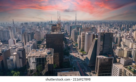 Aerial view of Av. Paulista in São Paulo, SP. Main avenue of the capital. With many radio antennas, commercial and residential buildings. Aerial view of the great city of São Paulo. Sunset sky