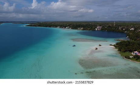 Aerial View Of Bacalar Lagoon And Blue Cenote, Near Cancun, In Riviera Maya, Mexico. Turquoise Blue Shallow Water And Beautiful Place To Go And Relax