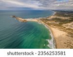 Aerial view of Baleal peninsula near Peniche town on the west coast of Portugal. Baleal island in Portugal with incredible beach at sunset. Portuguese travel and surfing destination.