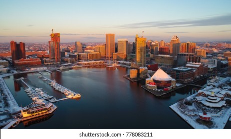 An aerial view of Baltimore's Inner Harbor at sunrise on a cold December morning.