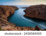 An aerial view of Bandar Al Khairan, Beautiful landscape with mountains and sea. Most popular place for vacation, holiday and adventure. best tourist spot near the Muscat for traveler. Oman.