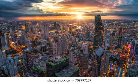 Aerial View Of Bangkok Buildings, Bangkok City Downtown With Sunset Sky, Transaction Beautiful Road Top View At Night Traffic