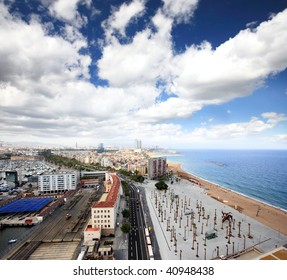 An Aerial View Of Barcelona City And Beach Spain