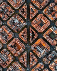 Aerial View Of Barcelona City Skyline With Morning Light. Catalonia, Spain. Cityscape With Typical Urban Octagon Blocks