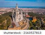 Aerial view of Barcelona skyline with Sagrat Cor temple during a sunny day, Catalonia, Spain