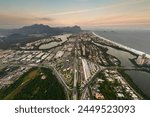 Aerial View of Barra da Tijuca District With Alvorada Bus Terminal, Cidade das Artes Cultural Complex and Mountains in the Horizon in Rio de Janeiro