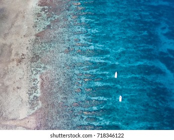 An Aerial View Of The Barrier Reef Along Turneffe Atoll In Belize Reveals Spur And Groove Channels That Exist Near Shore. This Type Of Reef Often Develops On Windward Sides Of Tropical Islands.