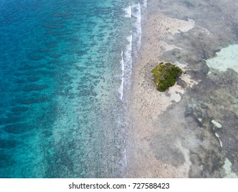 An Aerial View Of The Barrier Reef Along Turneffe Atoll In Belize Reveals Spur And Groove Channels That Exist Near Shore. This Type Of Reef Often Develops On Windward Sides Of Islands.