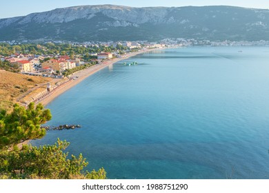 Aerial view of Baska village and the Vela beach.