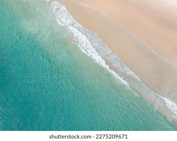 Aerial view of a beach with stunning clear water and warm white sand in a holiday paradise near the Pacific Ocean - Shutterstock ID 2275209671