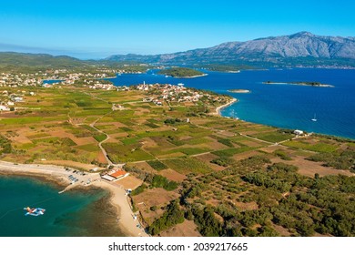 Aerial view of the beaches and fields near Lumbarda town on Korcula Island, Adriatic Sea in Croatia